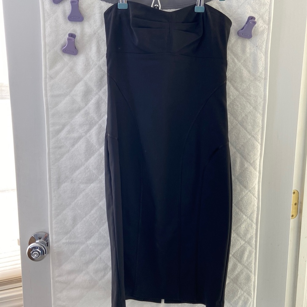 Tight black strapless dress